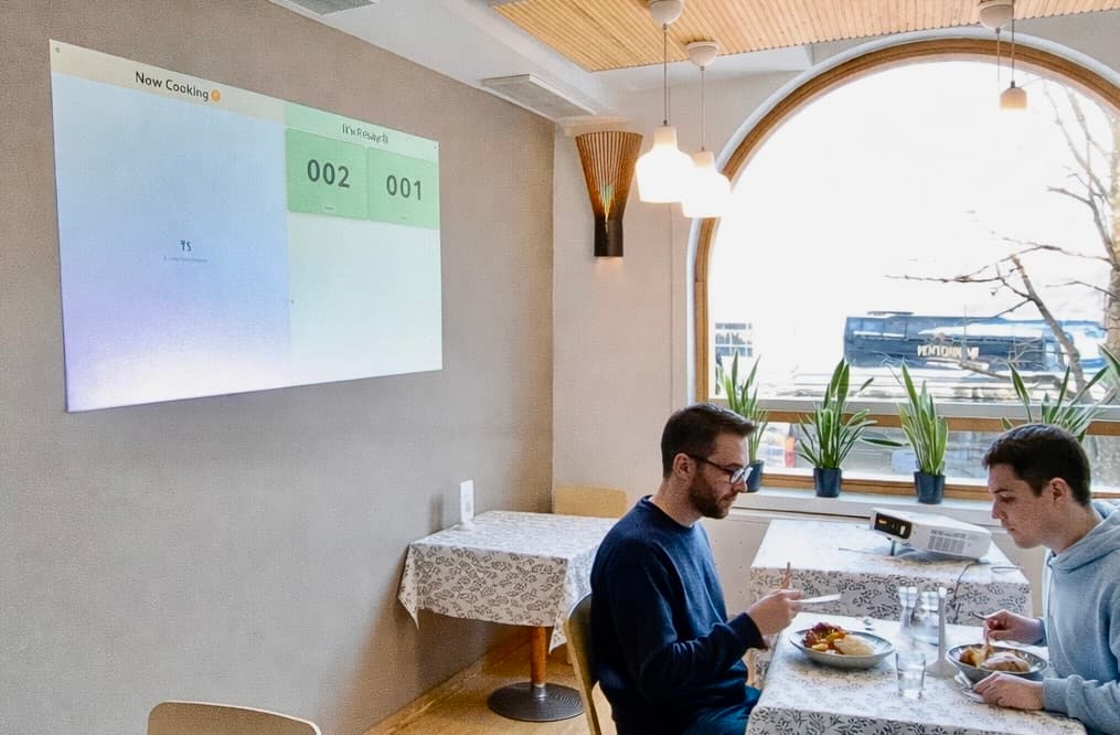 How Order Status Display Replaced a Failed Bell System with a Projector Solution